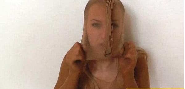 Blonde with nylon mask on her face